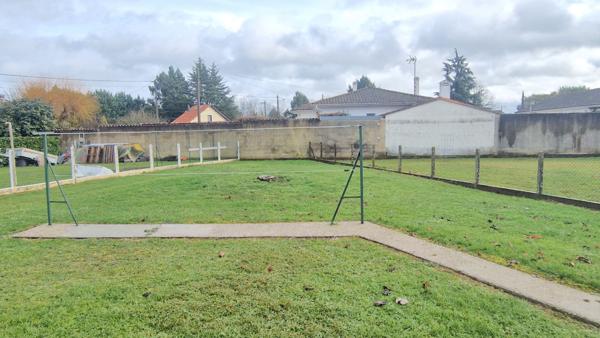 Plain-pied fonctionnel avec garage aménageable et terrain de 750 m²