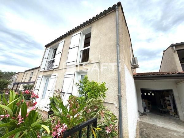 MAISON AVEC JARDIN ET UN GARAGE