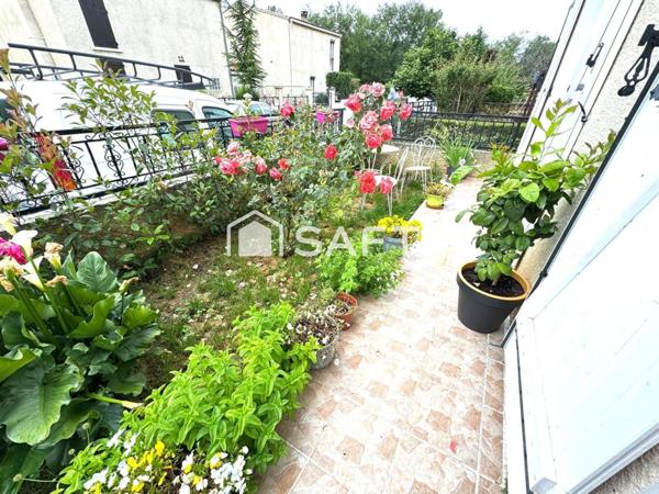 MAISON AVEC JARDIN ET UN GARAGE