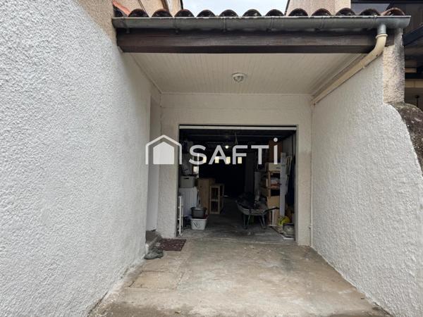 MAISON AVEC JARDIN ET UN GARAGE