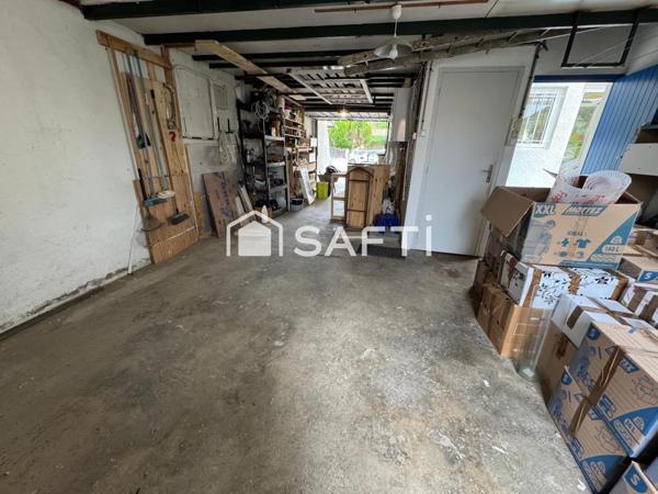 MAISON AVEC JARDIN ET UN GARAGE