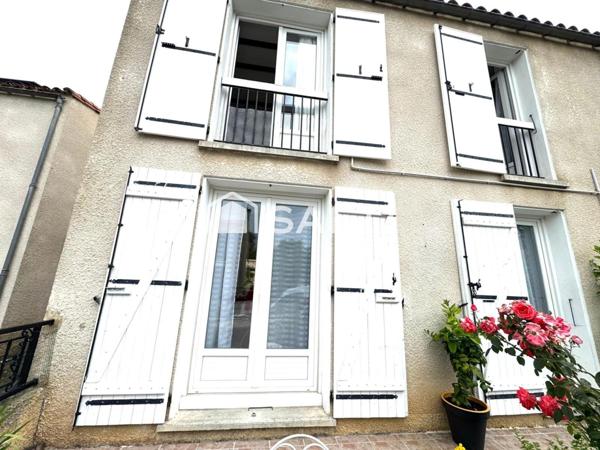 MAISON AVEC JARDIN ET UN GARAGE