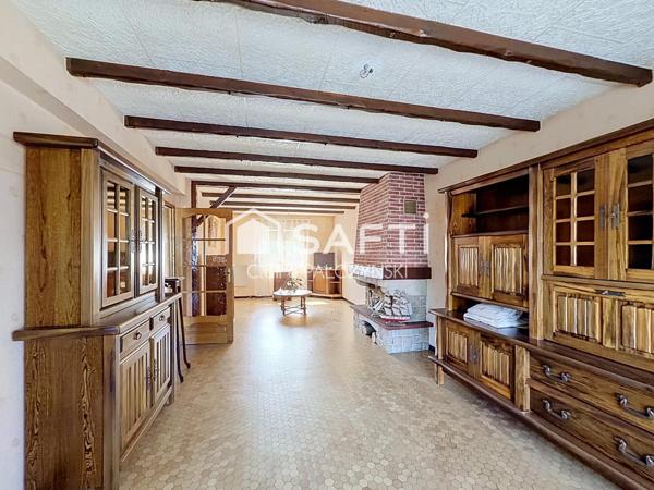 EXCLUSIVITÉ SAFTI – Maison de 98 m² avec jardin, garage et sous-sol complet