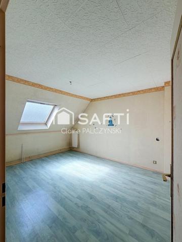 EXCLUSIVITÉ SAFTI – Maison de 98 m² avec jardin, garage et sous-sol complet