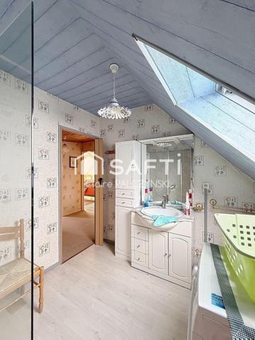 EXCLUSIVITÉ SAFTI – Maison de 98 m² avec jardin, garage et sous-sol complet