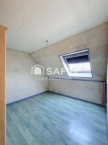 EXCLUSIVITÉ SAFTI – Maison de 98 m² avec jardin, garage et sous-sol complet
