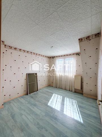 EXCLUSIVITÉ SAFTI – Maison de 98 m² avec jardin, garage et sous-sol complet