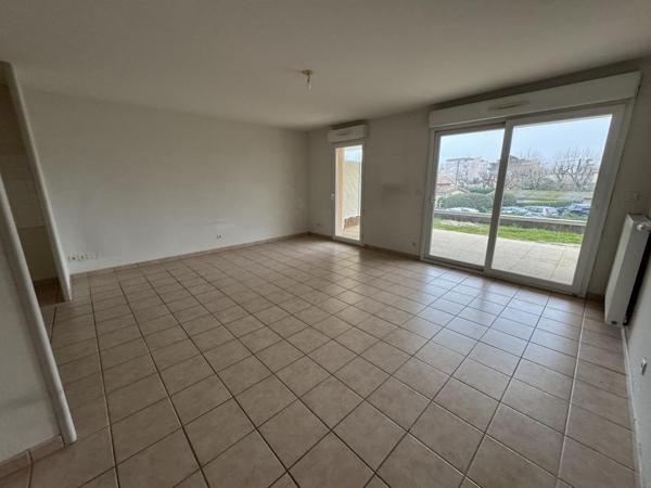 APPARTEMENT T3 - 75.32 M2 AVEC JARDIN ET GARAGE
