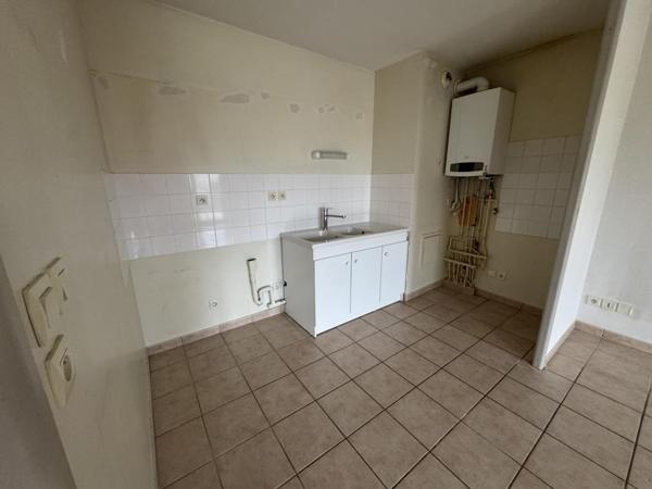 APPARTEMENT T3 - 75.32 M2 AVEC JARDIN ET GARAGE