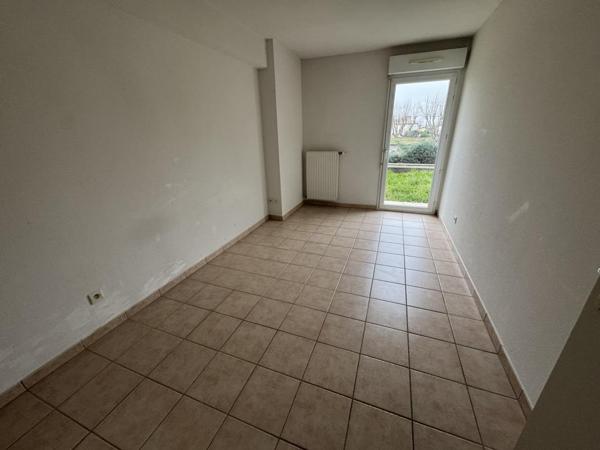 APPARTEMENT T3 - 75.32 M2 AVEC JARDIN ET GARAGE
