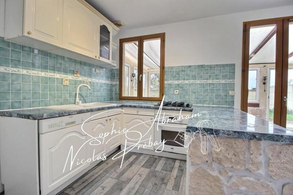 Maison individuelle de 4 chambres avec garage et jardin clos