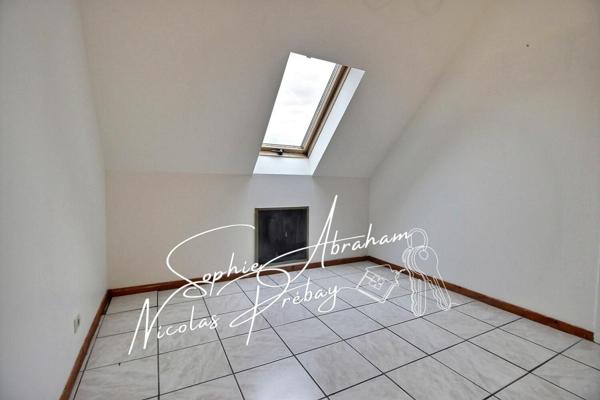 Maison individuelle de 4 chambres avec garage et jardin clos