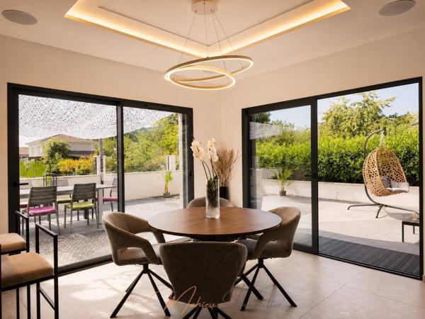 Maison 5 pièces 133m² à vendre à Saint-Genis-Pouilly 01630