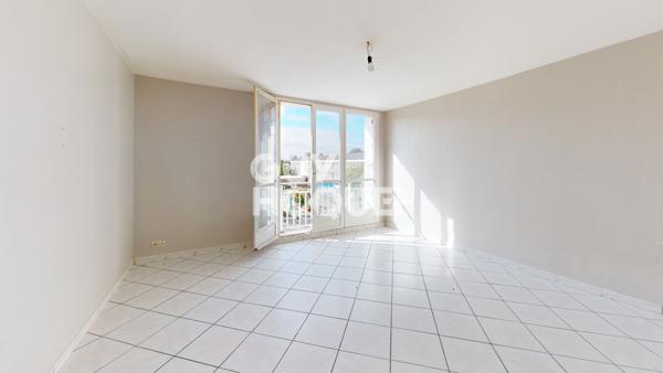 Appartement T4 de 74 m² – 3 chambres – Balcon – Cave