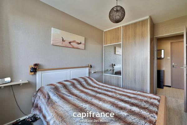 St Genis Laval - Appartement T3 de 61m² avec place de stationnement et cave dans résidence sécurisée avec ascenseur