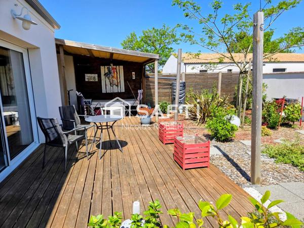 PLAIN PIED IMPECCABLE , DEUX CHAMBRES , GARAGE, JARDIN ET PLUS !