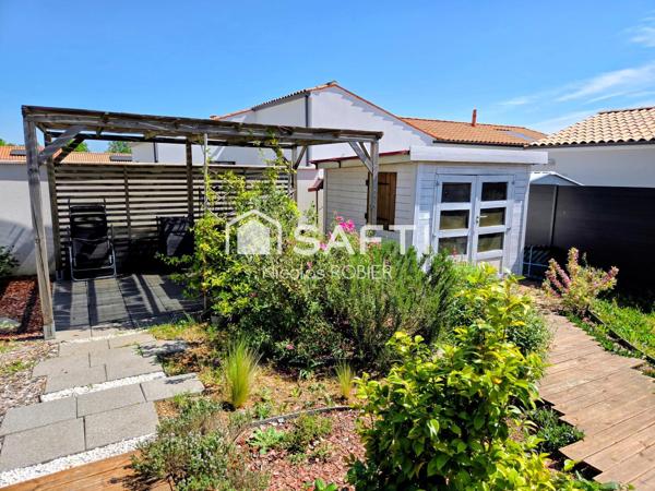 PLAIN PIED IMPECCABLE , DEUX CHAMBRES , GARAGE, JARDIN ET PLUS !
