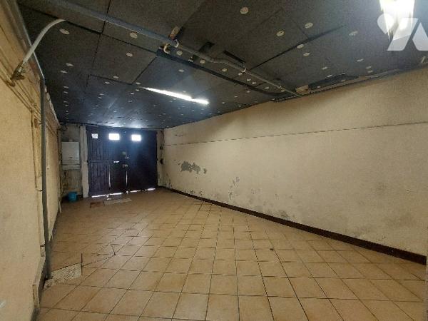 SAINT-GAUDENS, centre-ville, maison de ville avec jardin attenant, idéalement située.