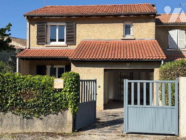 Jolie maison mitoyenne avec son jardin et belle exposition.