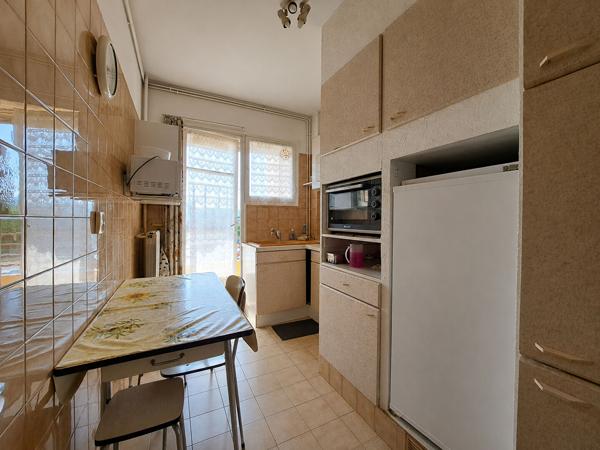 Appartement 4 pièces-Centre-ville- traversant- Parking s/s -cave