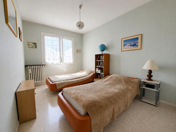 Appartement 4 pièces-Centre-ville- traversant- Parking s/s -cave