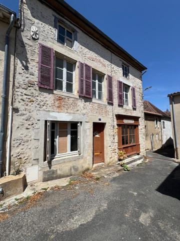Maison de caractère avec ancien commerce – Charme authentique et fort potentiel d'aménagement