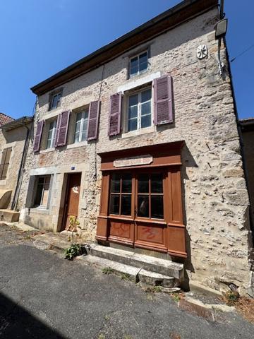 Maison de caractère avec ancien commerce – Charme authentique et fort potentiel d'aménagement
