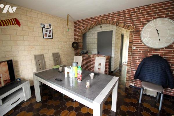 Maison avec garage et cour