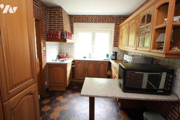 Maison avec garage et cour