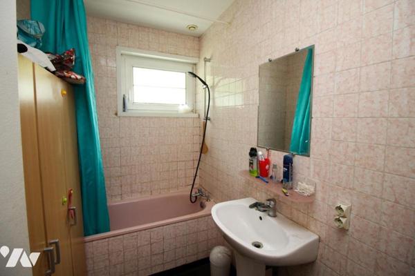 Maison avec garage et cour