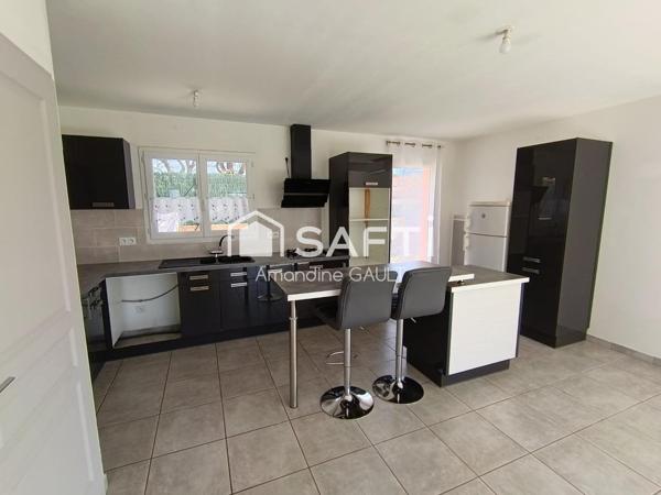 Maison avec jardin associant performance et charme prêts à vivre !