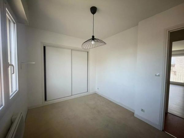 Appartement 2 chambres, balcon, garage