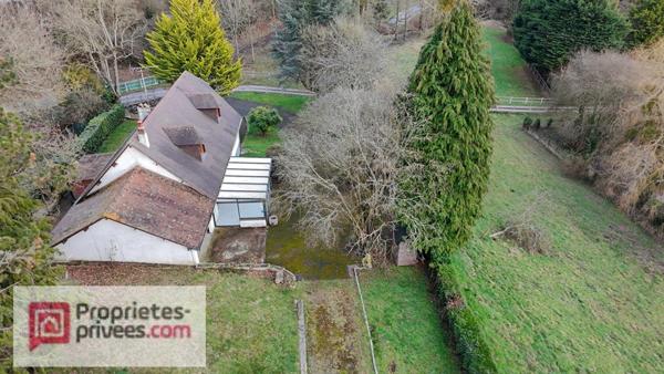 Grande maison familiale aux portes de Lisieux, dans un environnement boisé