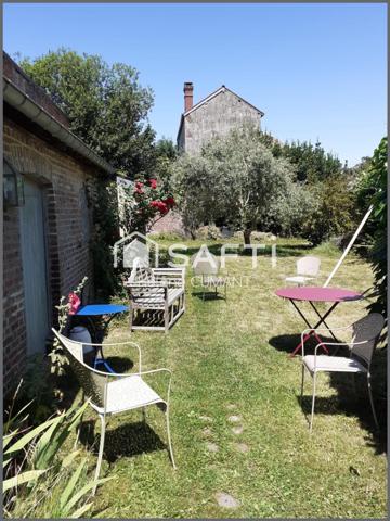 Élégante maison de maître rénovée – proche des commerces, jardin et garage.