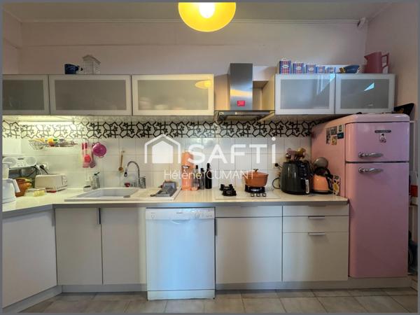 Élégante maison de maître rénovée – proche des commerces, jardin et garage.