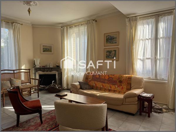 Élégante maison de maître rénovée – proche des commerces, jardin et garage.