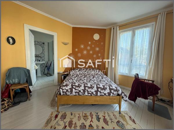 Élégante maison de maître rénovée – proche des commerces, jardin et garage.