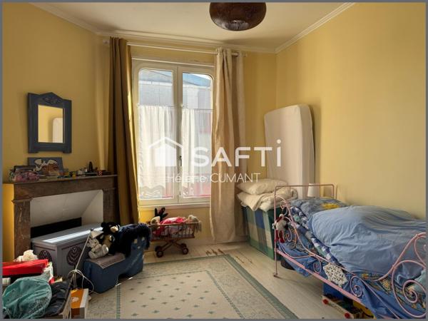 Élégante maison de maître rénovée – proche des commerces, jardin et garage.