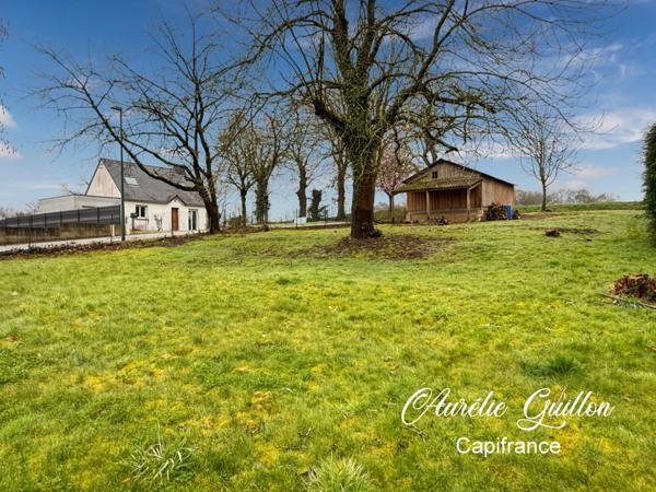 TERRAIN 690 M2 AVEC HANGAR