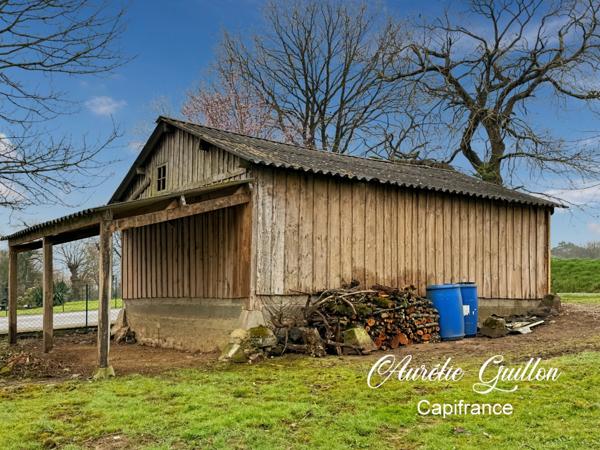 TERRAIN 690 M2 AVEC HANGAR