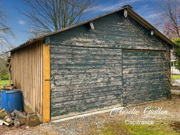 TERRAIN 690 M2 AVEC HANGAR