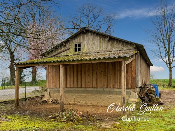 TERRAIN 690 M2 AVEC HANGAR