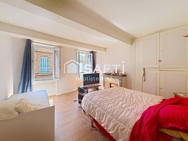 Immeuble en plein cœur de village