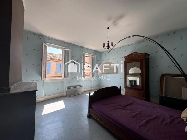 Immeuble en plein cœur de village