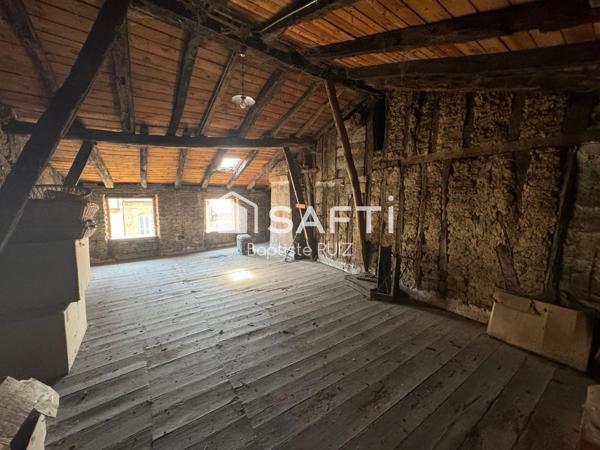 Immeuble en plein cœur de village