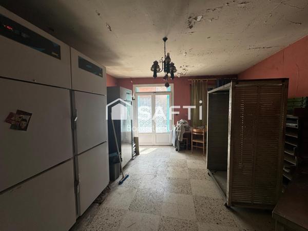 Immeuble en plein cœur de village