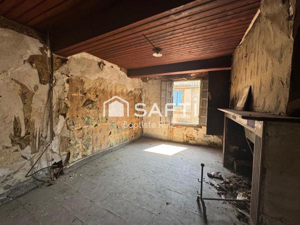 Immeuble en plein cœur de village