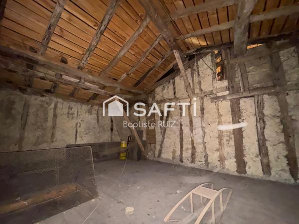 Immeuble en plein cœur de village