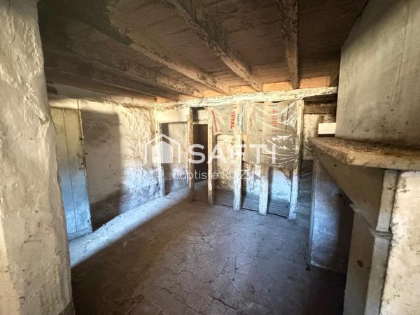 Immeuble en plein cœur de village