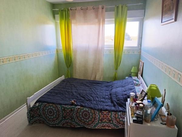 Appartement lumineux 4 pièces avec cave et stationnement – Résidence sécurisée